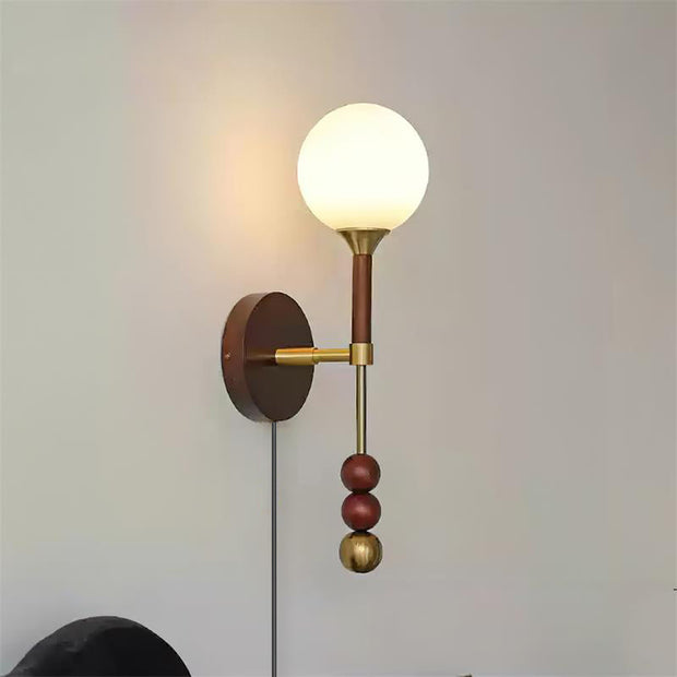Wall Lamp with Glass Globe and Walnut Wood Accents Plug-In