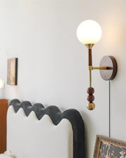 Wall Lamp with Glass Globe and Walnut Wood Accents Plug-In
