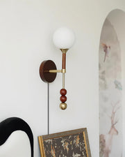 Wall Lamp with Glass Globe and Walnut Wood Accents Plug-In